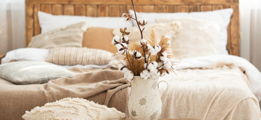 Cozy,Wooden,Bed,With,Handmade,Linen,And,A,Lot,Of